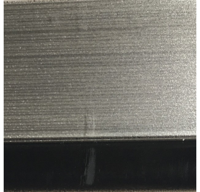Крайка 23*1.3 Rehau 1521E (3D) Чорний глянець